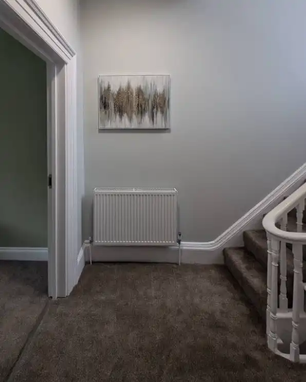 Staircase hallway painted by Fineline Decorators in Plymouth Devon