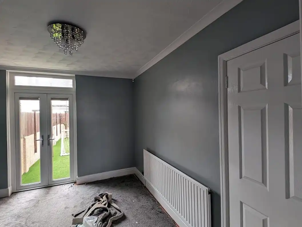 Living room painting with grey walls by Fineline Decorators in Plymouth and Devon