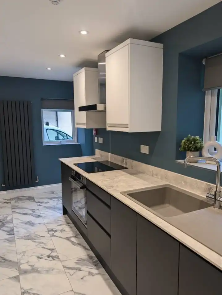 Kitchen storage area with feature wall painted by Fineline Decorators Plymouth, Devon & Cornwall