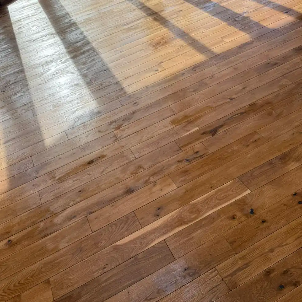 Refurbished wooden floor in natural light by Fineline Decorators Plymouth, Devon & Cornwall