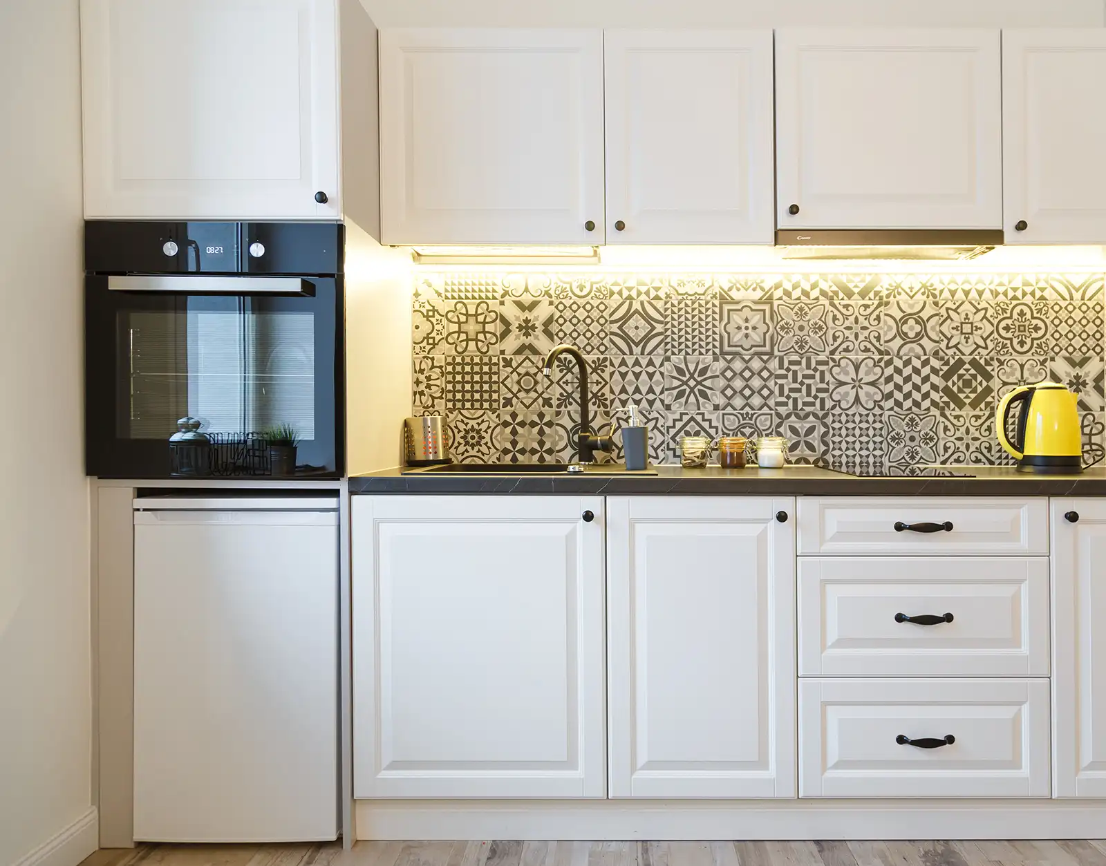 Kitchen decorating with patterned tiles by Fineline Decorators Plymouth Devon