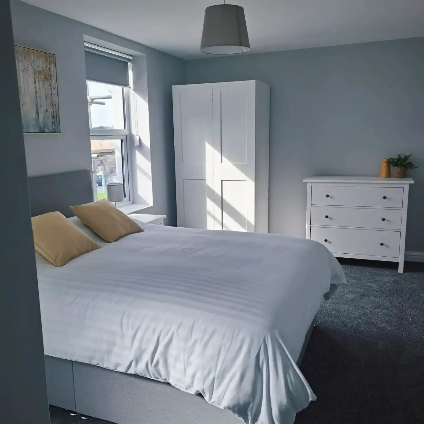 Light grey bedroom decorating project by Fineline Decorators in Plymouth Devon