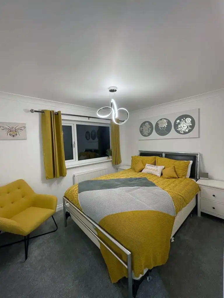 Modern bedroom redecorated with feature colours by Fineline Decorators Plymouth, Devon & Cornwall