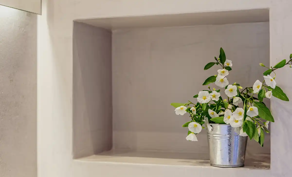 Freshly painted alcove shelving with neutral tones by Fineline Decorators Plymouth, Devon & Cornwall